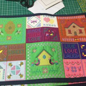 Set of hand made place mats embroidered and sewn these are beautiful.